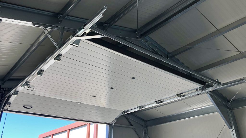 insulated-storage-building-overhead-door-inside-roof